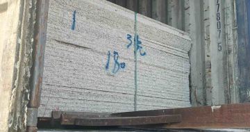 银川 芝麻白花岗岩石材3.0公分光面毛板装柜出货