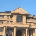 银川黄金麻别墅外墙干挂石材效果示例