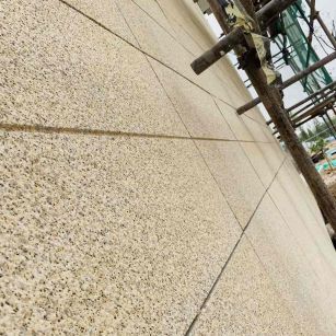 银川 黄金麻花岗岩荔枝面外墙干挂石材效果示例